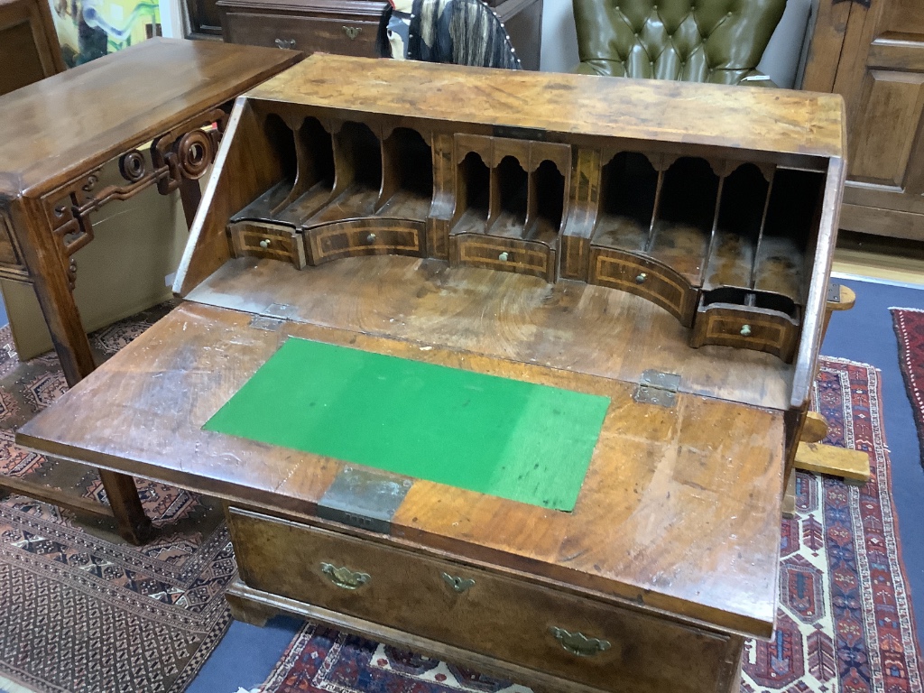A George II walnut bureau, width 91cm depth 52cm height 97cm